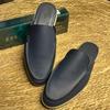 New lychee pattern cowhide leather men's shoes flat-bottomed bag head slippers men's flat-bottomed outer wear one and a half slippers