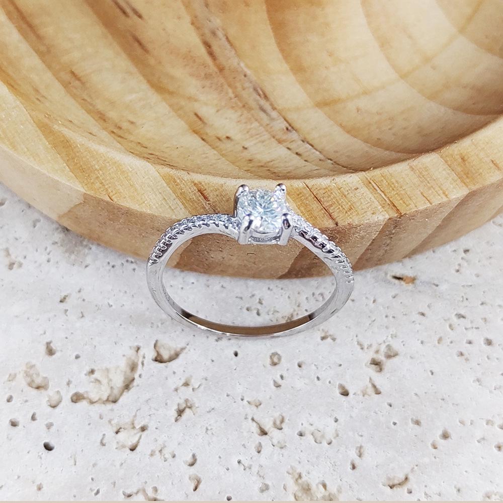 S925 Sterling Silver 50-Point Twisted Moissanite Ring with Four-Prong Setting