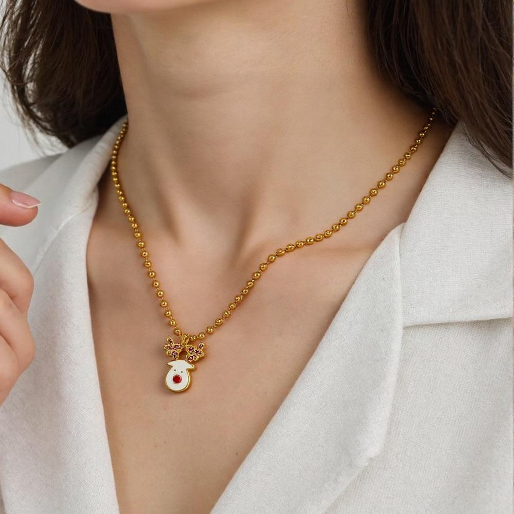 Weihnachtskollektion: Perlenkette mit Anhängern von Baum, Schneemann, Weihnachtsmann, Rentier, Kranz, Handschuhen und Socken