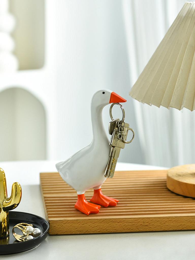 1pc, Magnetic Goose Key é uma escultura de decoração de casa de corrente, decoração de mesa de escritório, escultura de pato de ganso de resina, porta-ferramentas para casa