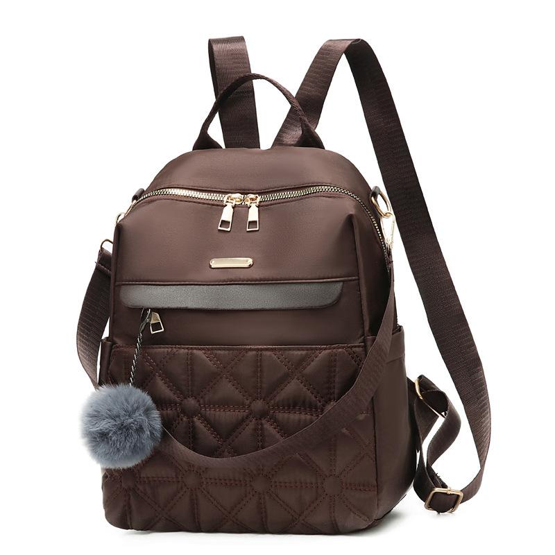 

Women s backpack dual-purpose Oxford cloth large capacity niche design high sense lightweight travel backpack темно-коричневого кольору