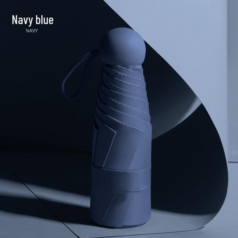 50 % rabatt på svart kapselparaply i lommeformat - Seks-skjerms sammenleggbar for sol og regn