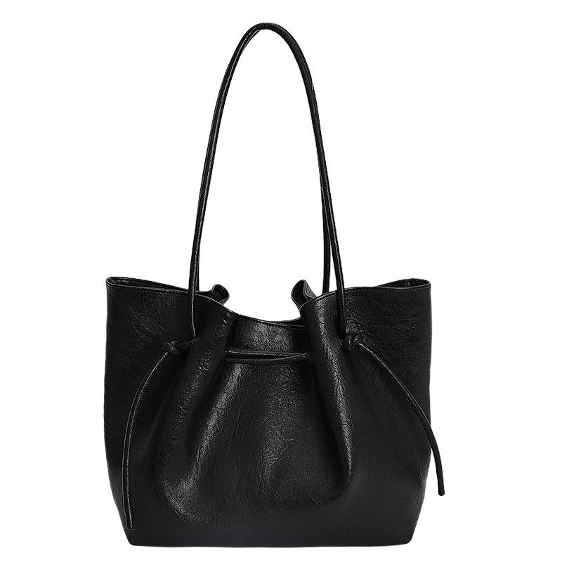 Korean version of high-value large-capacity bag women's autumn 2025 new shoulder bag commuting to work portable tote bag