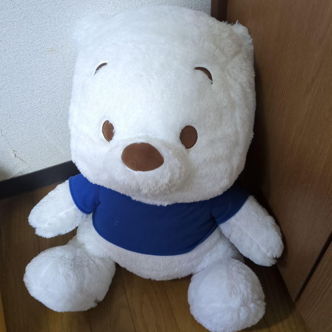 Winnie the Pooh plush toy blue clothes
