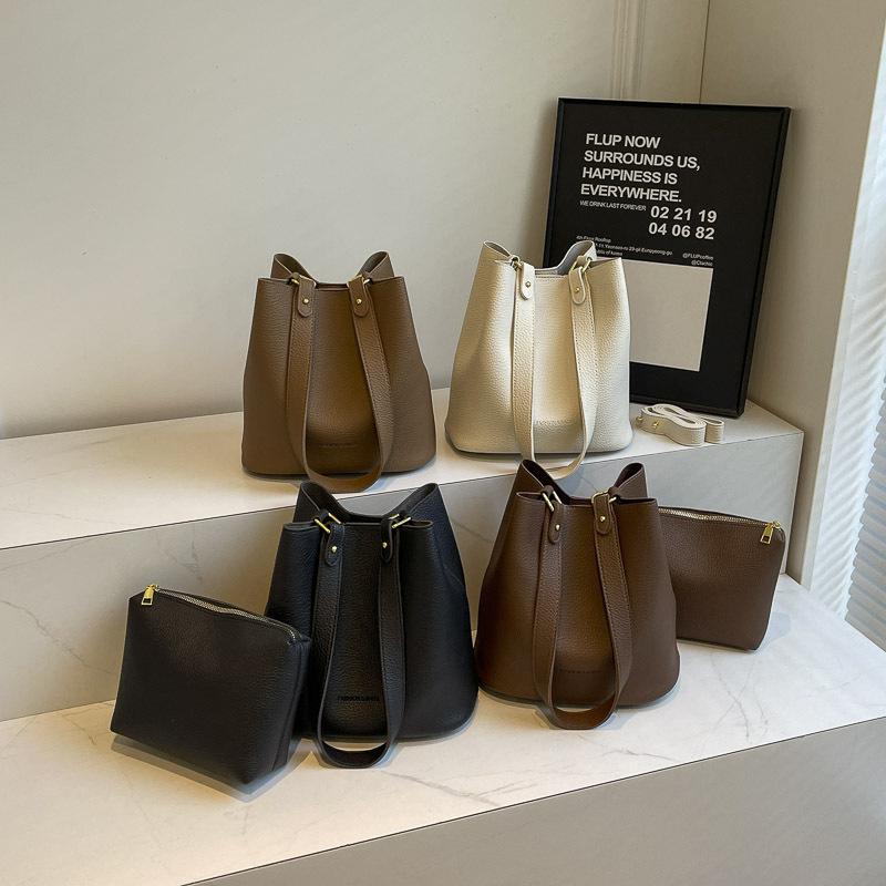 Textured retro tote bucket bag women's 2026 spring new casual light luxury niche shoulder messenger bag