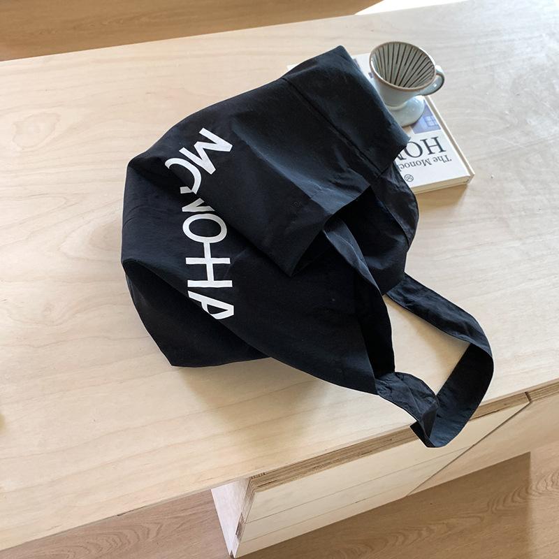 Lazy wind casual large-capacity underarm bag women's 2025 new letter-printed canvas bag shoulder bag