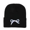 2025 autumn and winter new knitted hat children's trend versatile cold hat Korean version outdoor bow wool hat