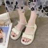 Thick soled sandals with feminine fairy style 2025 summer new elastic band student flat Roman shoes