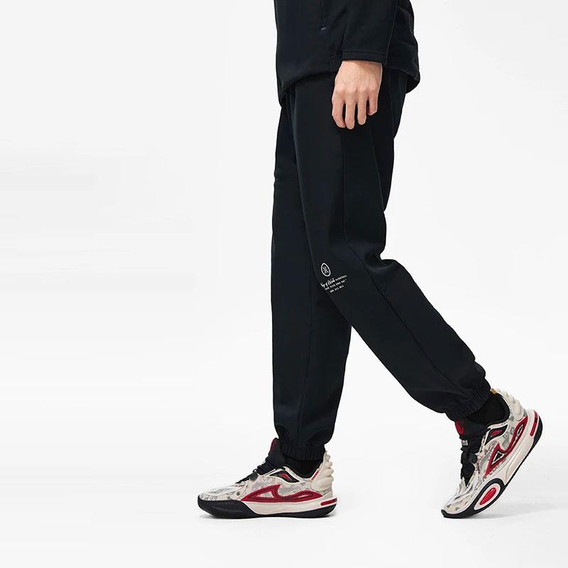 Li-Ning Letter Logo Printed Cuffed Fleece Water-Resistant Loose Knit Sports Pants Men Pants Black AYKT693-1