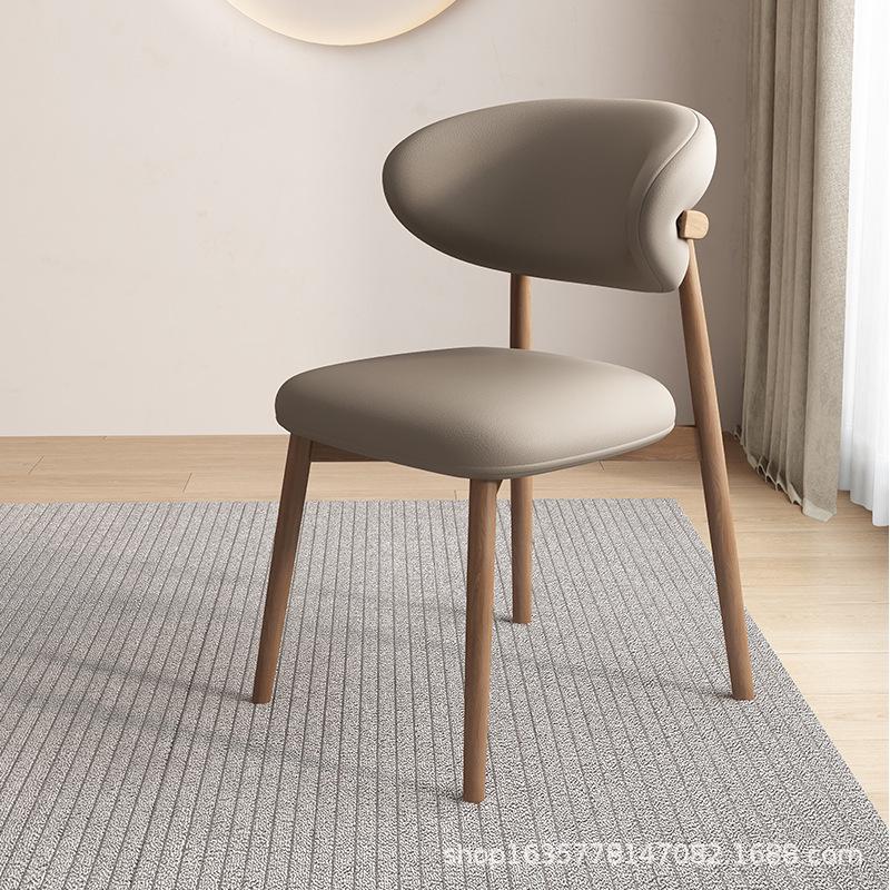 Nordic Modern Minimalist Solid Wood Dining Chair with Soft Pack Backrest - Comfortable Light Luxury Ram's Horn Design for Home, Restaurant, and Hotel.