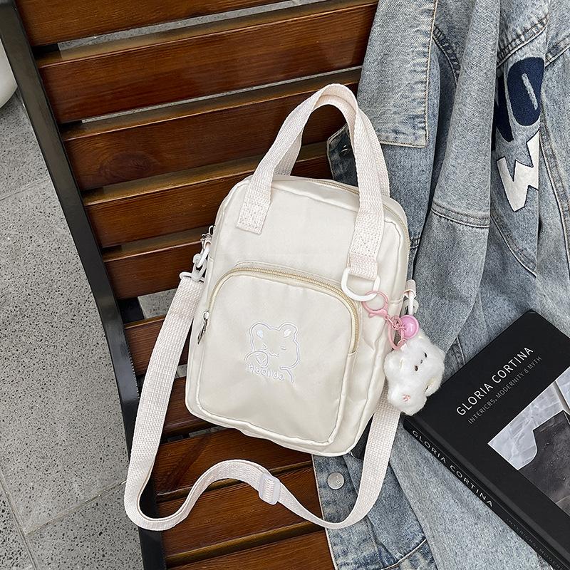 High-value cute cartoon bear messenger bag, versatile for teenagers and girls, small square bag for going out to work, commuting mobile phone bag