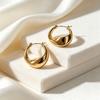 Curved Gold Stainless Steel Earrings - Simple, Luxurious Design with Bright Surface for Versatile Style.