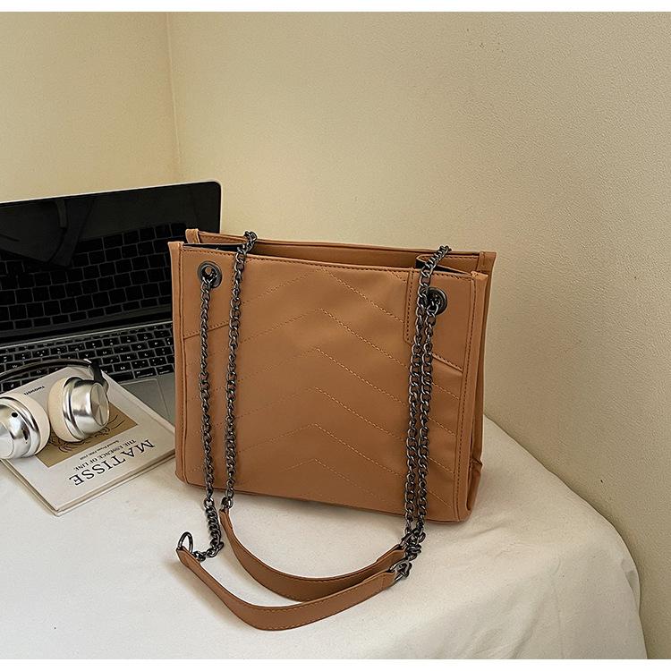 

Embroidered thread chain portable commuter tote bag 2025 new niche design Korean version shoulder bag large capacity bag women хаки