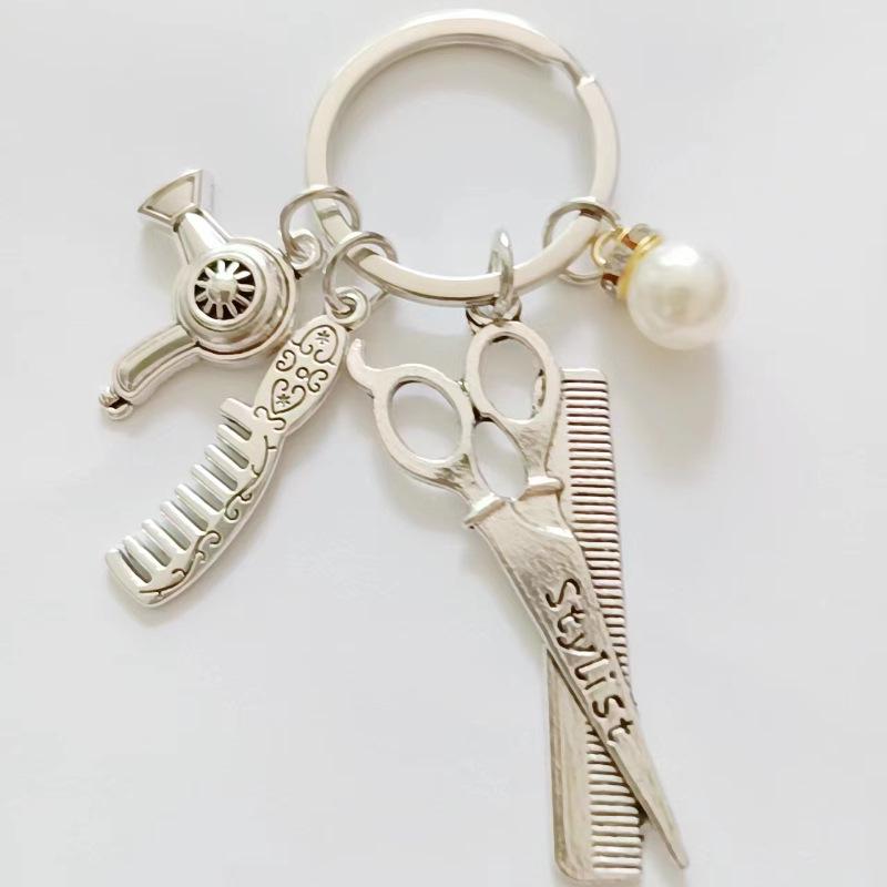 

Stylist Keychain: Scissors, Comb, Clippers & Dryer срібний