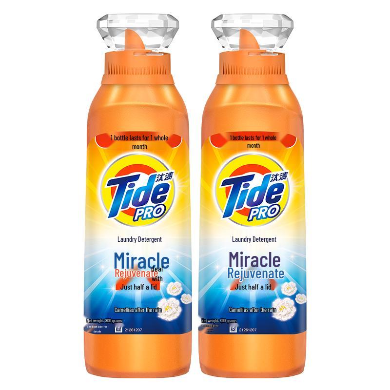 

Жидкое средство для стирки Tide для удаления пятен - Аромат «Дождь после камелии»