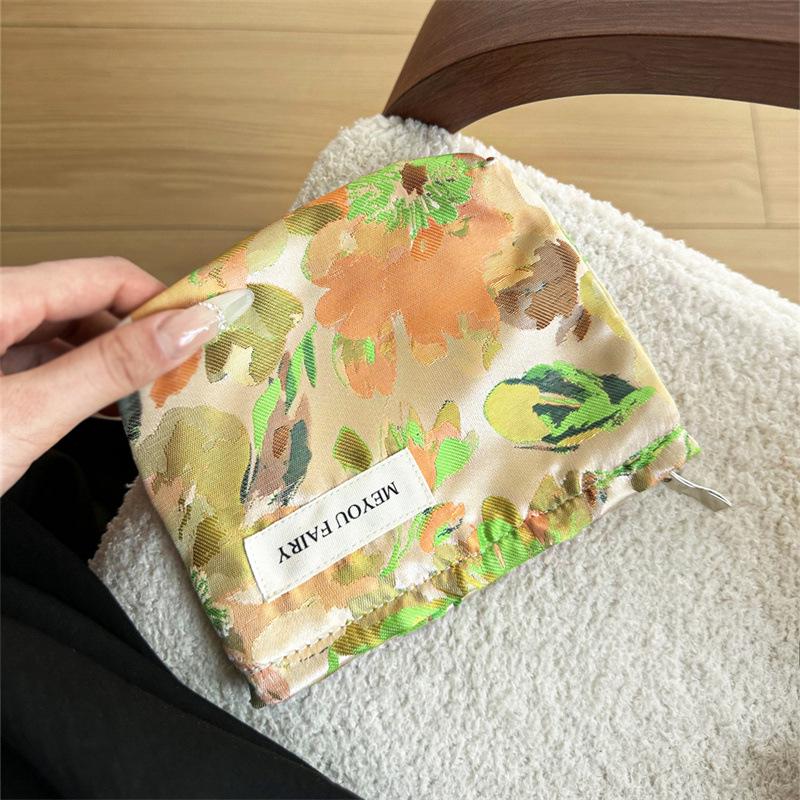 "Compact Fresh Cosmetic & Skincare Travel Bag - Portable Handheld Storage for Toiletries & Underwear"