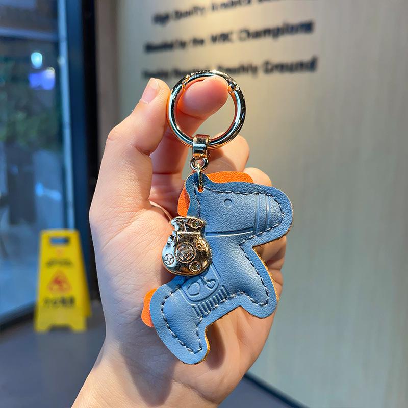 

Элегантный кожаный брелок в виде пони: Мини-рюкзак-подвеска и небольшой подарок темно-синий