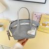 Korean senior sense of bucket shape soft and durable fashion exquisite new light luxury commuting slanting cross shoulder handbag