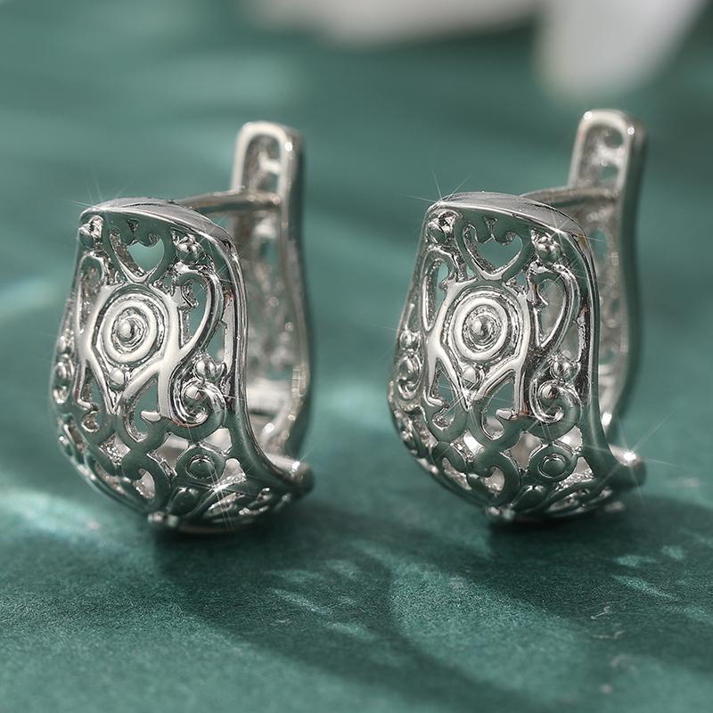 Exquisite gold-silber plattierte handgeschnitzte hohle Creolen für Damen Elegante Hochzeits-Verlobungs-Schmuck-Accessoires Handwerkskunst