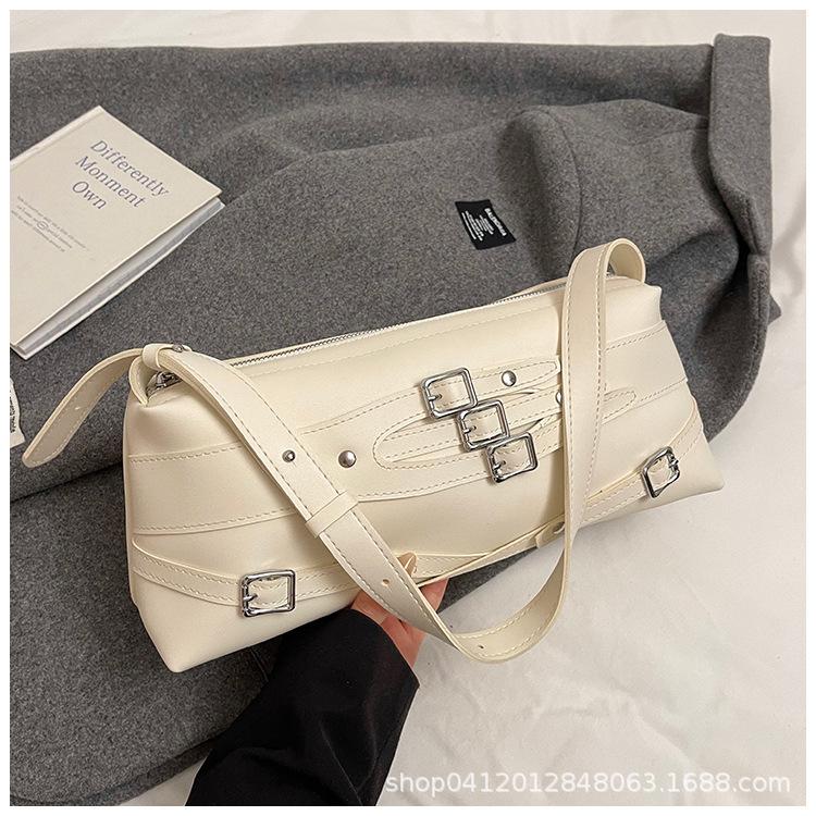 

Dame Korea niche design belt pin buckle armpit bag high-end light luxury bag women s 2025 new shoulder bag білий
