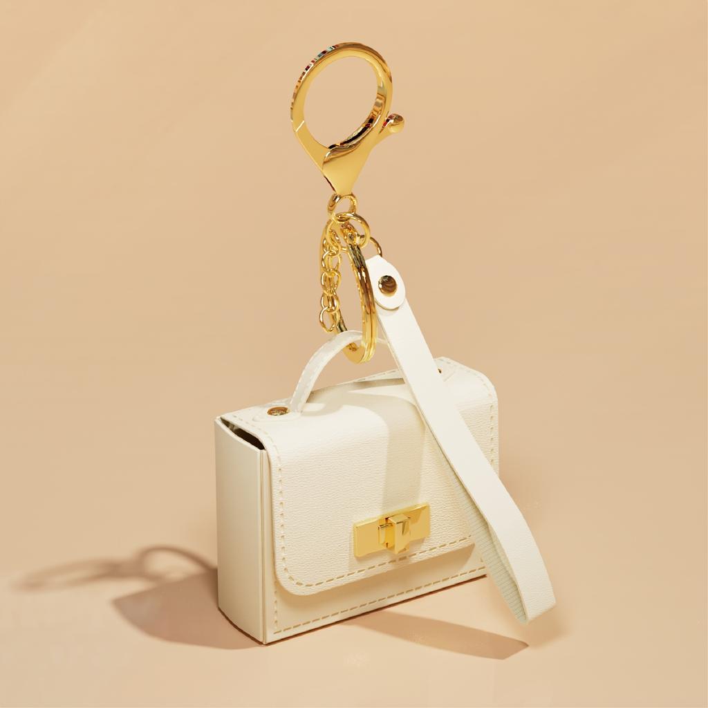 Portachiavi Mini Borsa in Ecopelle PU - Portamonete alla Moda con Dettagli Dorati, Design Compatto per Chiavi e Monete, Disponibile in Azzurro Chiaro, Rosa, Nero