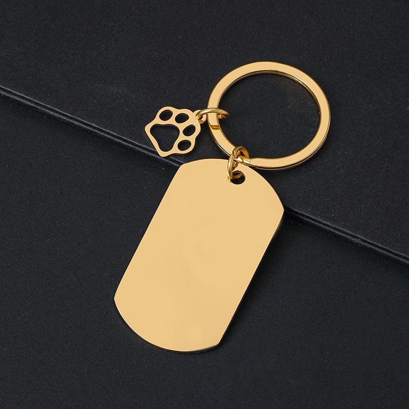 Breloczek do kluczy z łapą psa drukowaną laserowo - Międzynarodowy metalowy prezent