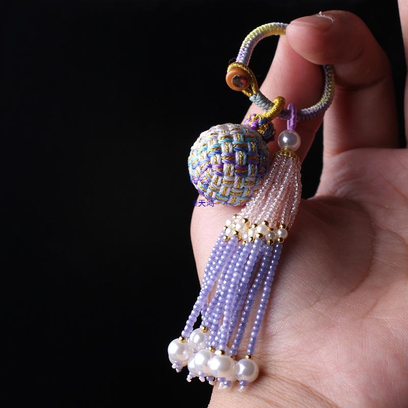 Number 16 Handmade Tassel Accessory with Ball Charm, Pearl, and Spinel Details.