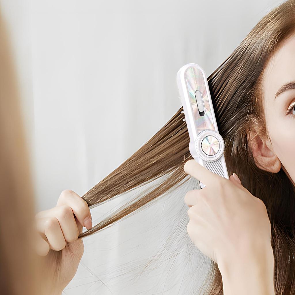 Elektrischer Haaröl-Handkamm mit rotem und blauem Licht für Frauen