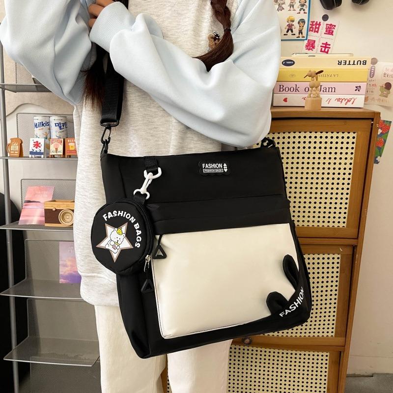 Versatile girl messenger bag women's new small fresh junior high school class commuter bag large capacity shoulder bag large capacity