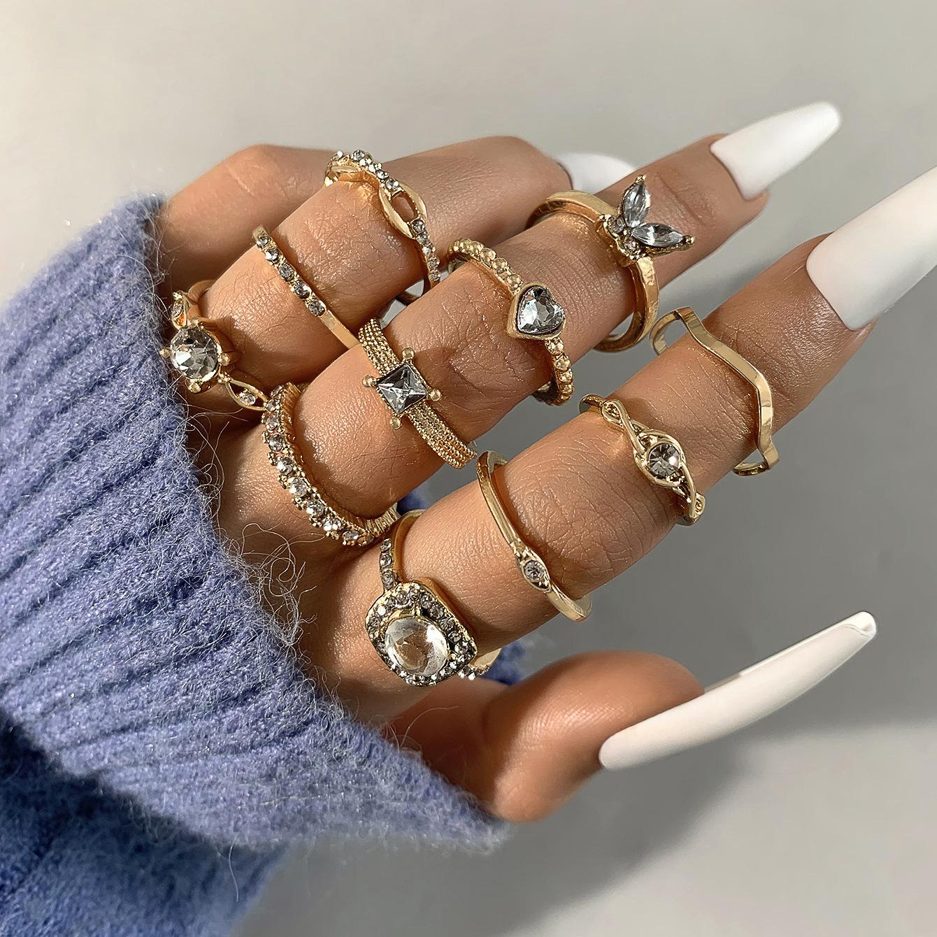 

Versatile geometric imitation gemstone set diamond love ring Fashionable rippled butterfly gold ring set of eleven