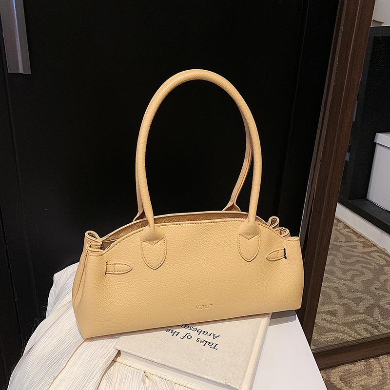 Нишевая сумка подмышку женская высококлассная сумка на плечо простая однотонная сумка-багет универсальная сумка-тоут