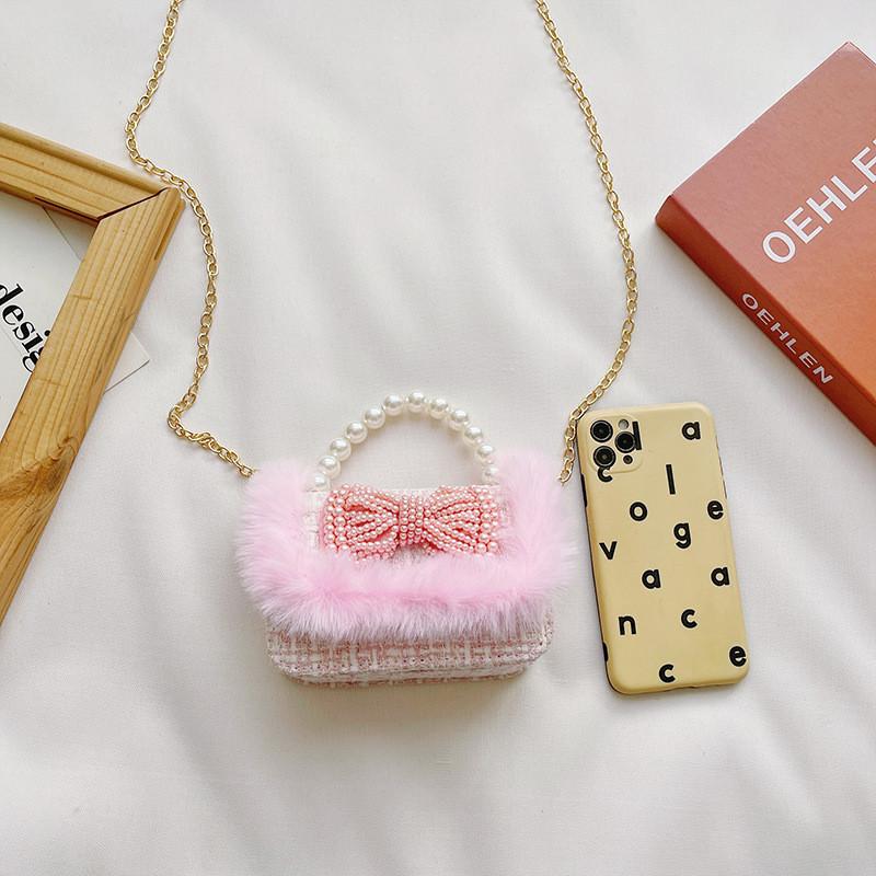 Charming Pearl Bow Mini Handheld Bag For Kids With Stylish Modern Design And Breathable Fabric