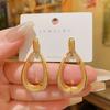 Design Advanced Sense Hollow Water Drop Simple Stud Earrings Temperament Earrings Light Luxury Earrings