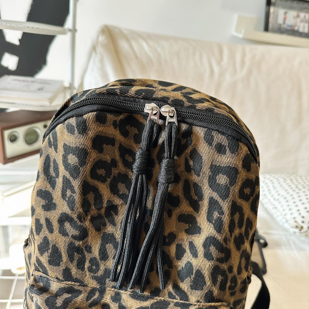 Leopard Print Backpack Casual Daily Use Trendy Street Style Lightweight Backpack for Women with Tassel Detail for School Travel and Everyday Outings