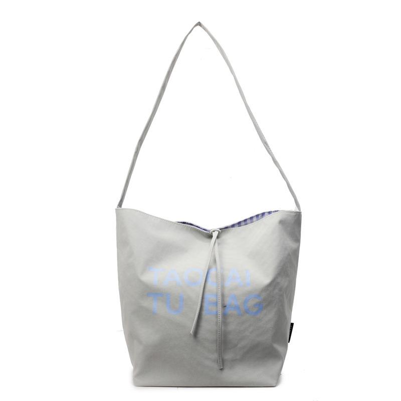 Lazy and lightweight cloth bag, tote bag, niche literary and artistic large-capacity shoulder bag, double-sided usable messenger bag.