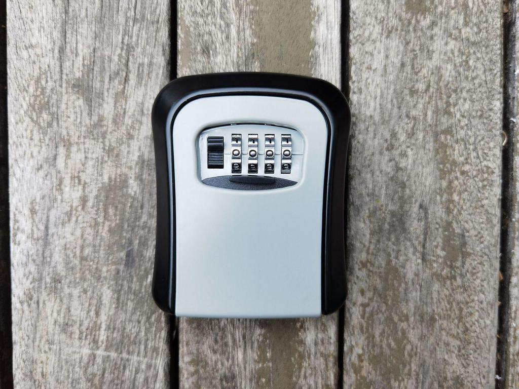 Wandmontierter Diebstahlsicherer Metallschlüsselkasten mit Katzenaugen-Dekoration und Passwortspeicher