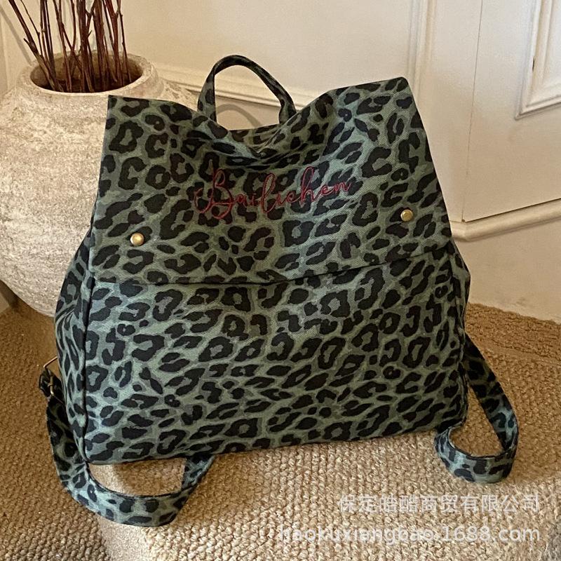 Leopard print backpack women's fashion niche design sense student class bag canvas retro tote bag travel backpack