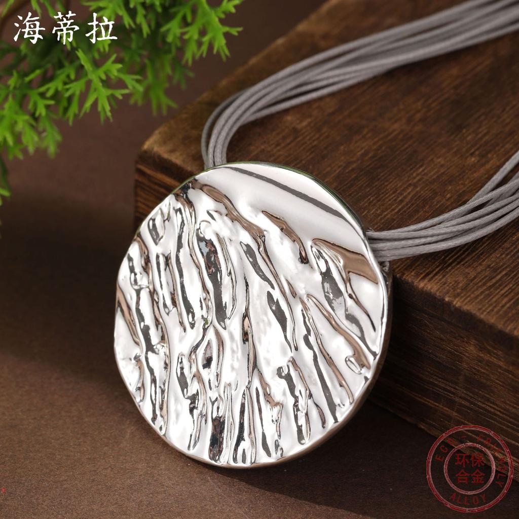 New smooth irregular disc leather rope magnetic necklace, women's exaggerated disc small pendant.