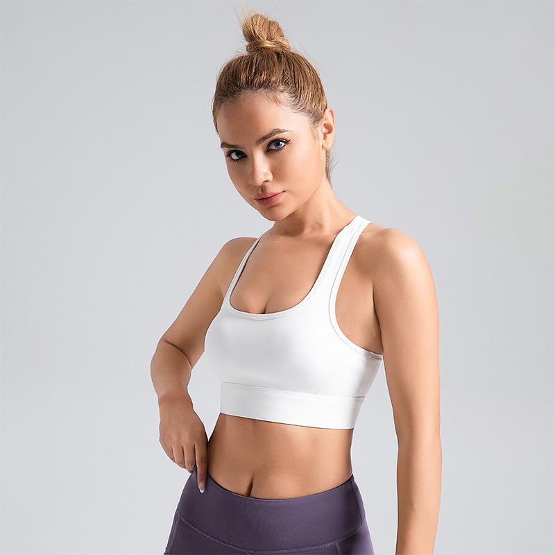 

Women s High-Impact Peach Sports Bra with Elegant Back Design for Yoga and Fitness S