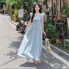 Elegantes Sommerkleid mit Puffärmeln und Schleife am Rücken, rückenfrei