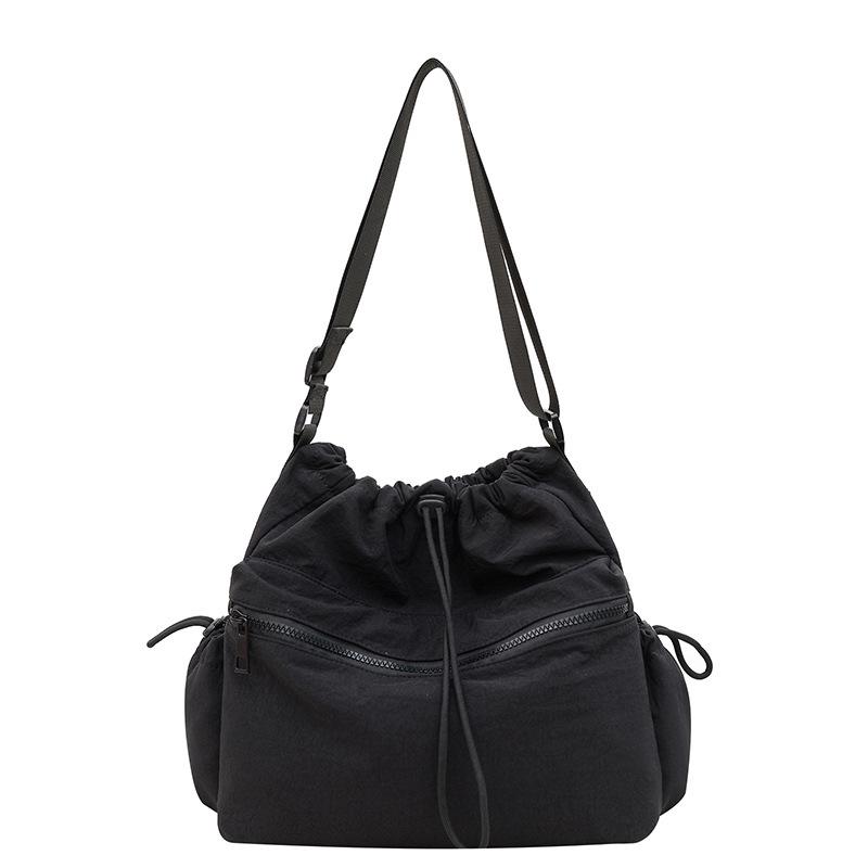 2025 new Japanese drawstring tote bag girls casual large-capacity niche design casual shoulder messenger bag