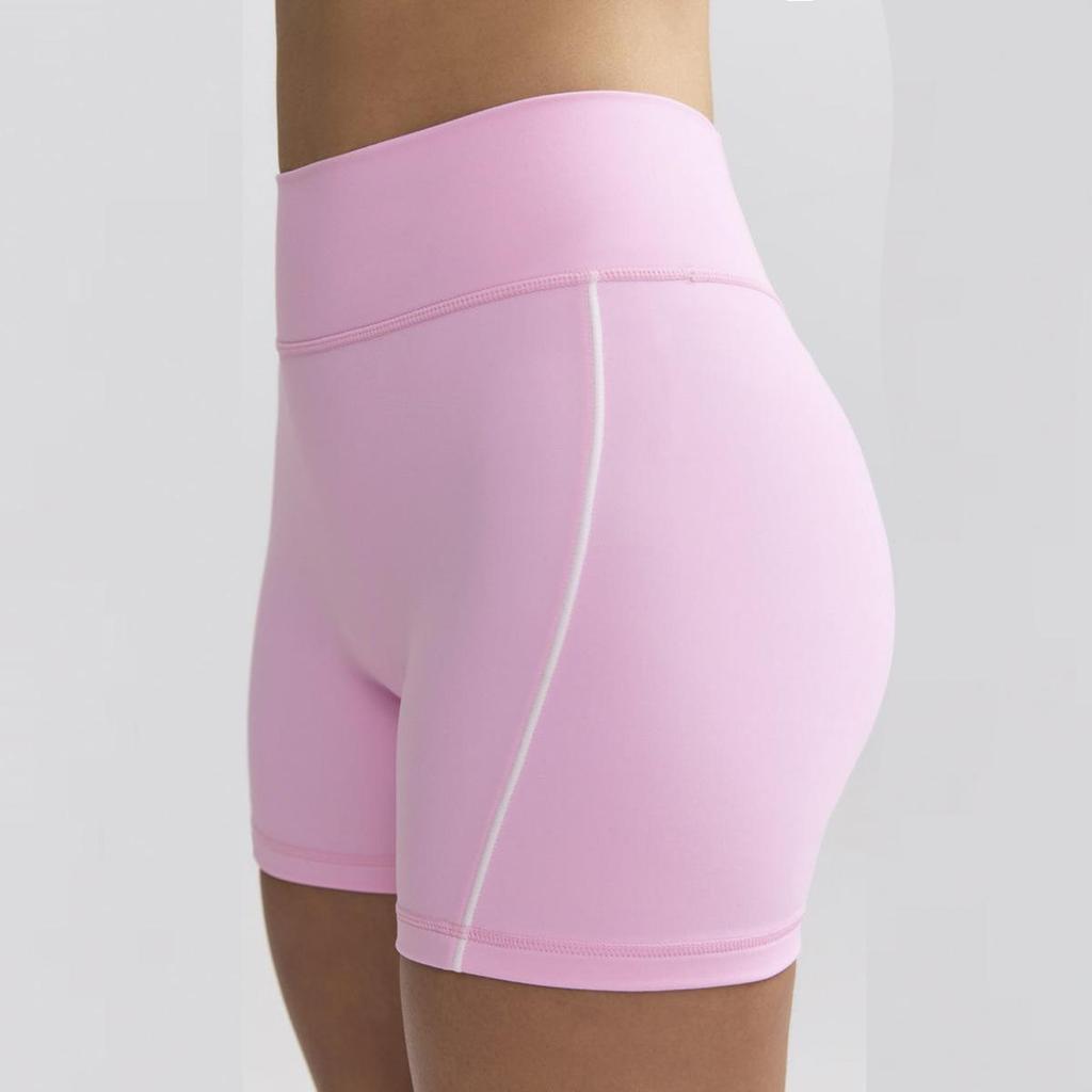 Yoga-Set in Kontrastfarbe: Hochelastischer Sport-BH und ausgestellte Hose mit Hüftlifting