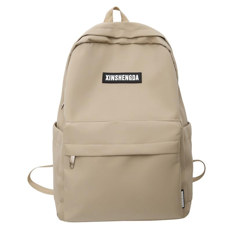Elementary school bag, female junior high school student solid color backpack, high school student large capacity casual backpack fashion