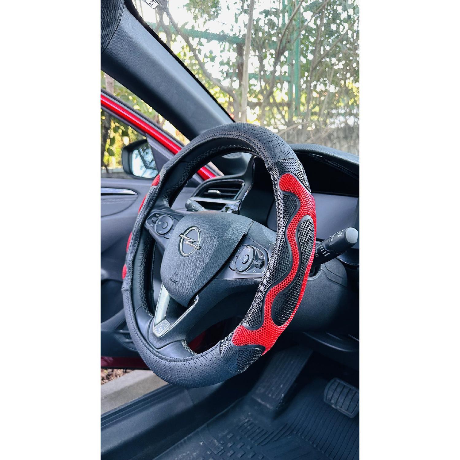 

Защелкивающийся чехол на рулевое колесо с трехмерным массажем красный
