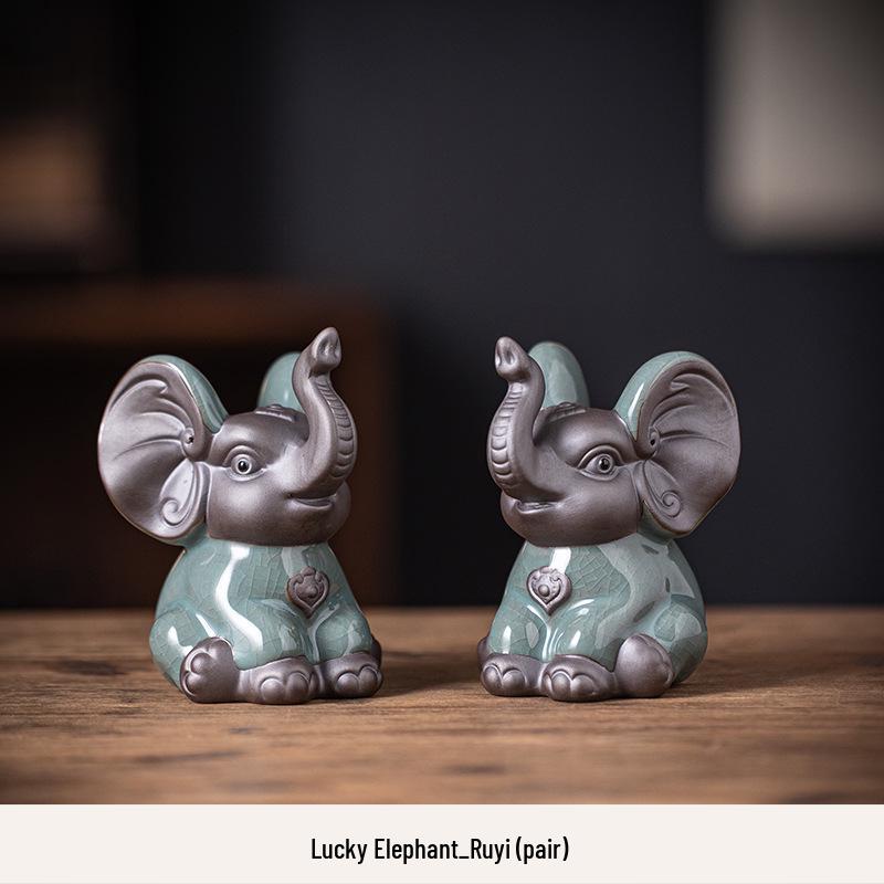 

Керамические фигурки слонов - приносящий богатство домашний декор для гостиной, винного шкафа или фойе.