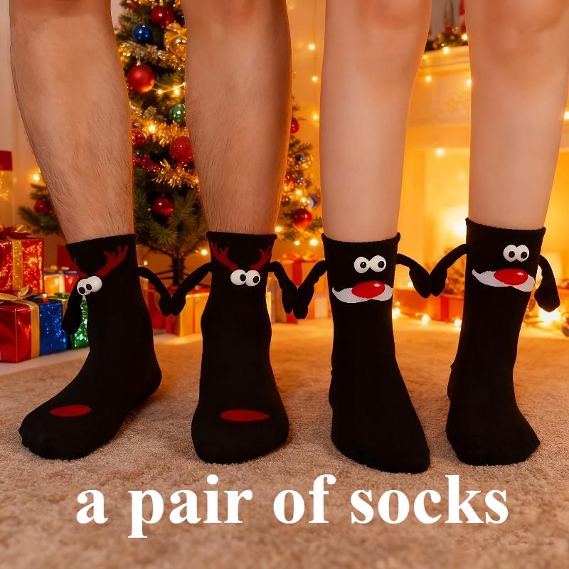 A pair of socks Fabric Christmas Socks - 3D Eyes Magnetic Cartoon Design, Hand-in-Hand Mid-Calf Playful Holiday Gift
