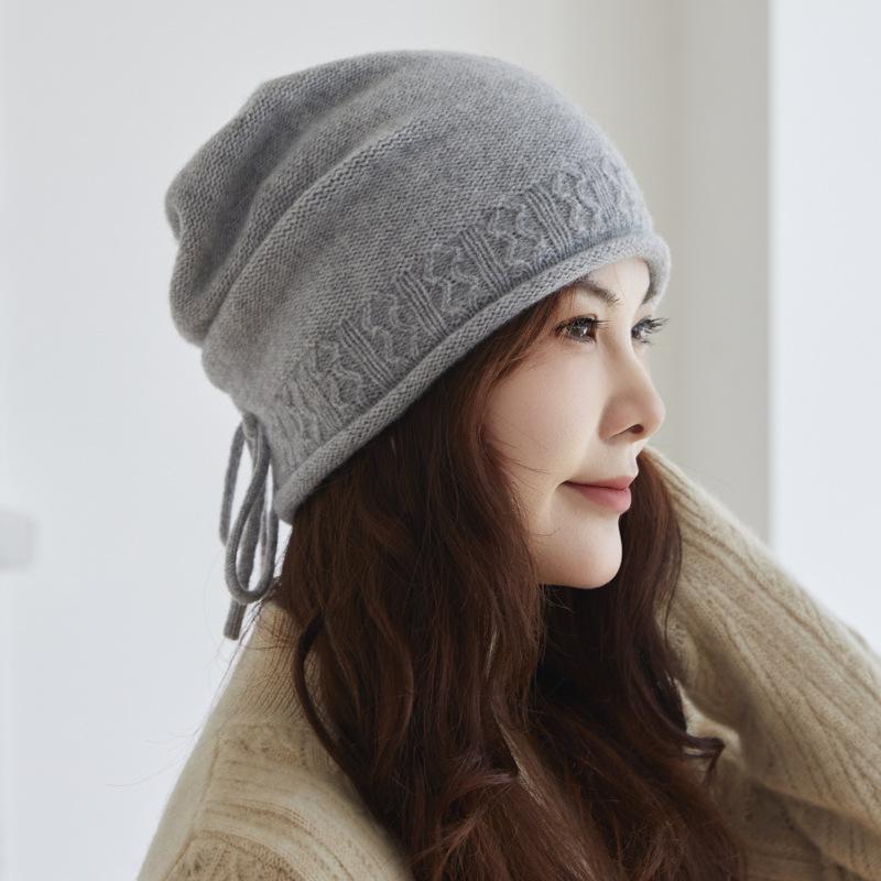 Cashmere autumn and winter new warm knitted drawstring stacking hat ear protector wool bag head cold hat