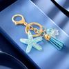 Starfish Ocean Tassel Keychain: Creative Resin Key Ring & Backpack Pendant for Women