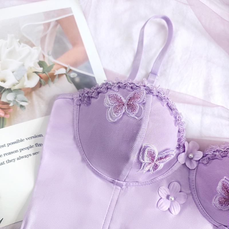 Gorsetowy top z haftem motyla i fiszbinami