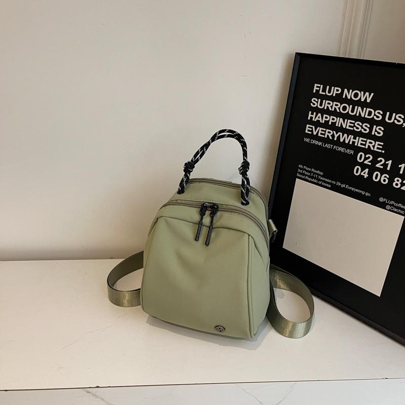 Fashion sense small backpack women's lightweight casual shoulder bag new fashion commuter shell bag simple commuter messenger bag